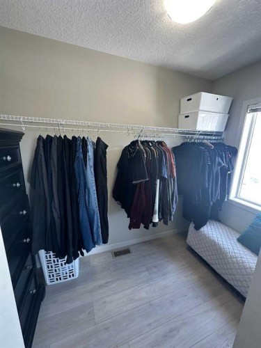113 Copperpond Row Se, Calgary, AB - Indoor With Storage