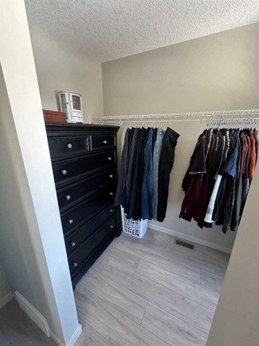 113 Copperpond Row Se, Calgary, AB - Indoor With Storage
