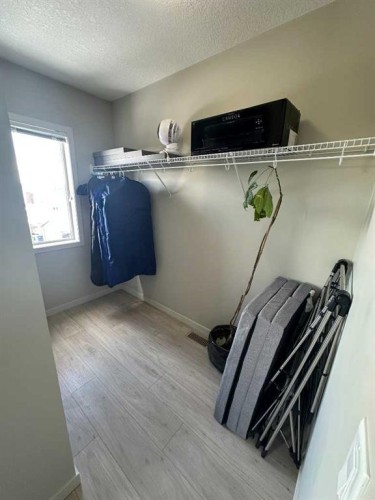 113 Copperpond Row Se, Calgary, AB - Indoor With Storage