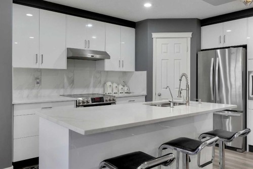 14 Marthas Close Ne, Calgary, AB - Indoor Photo Showing Kitchen With Upgraded Kitchen