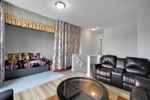 14 Marthas Close Ne, Calgary, AB - Indoor Photo Showing Living Room