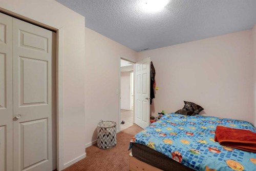 14 Marthas Close Ne, Calgary, AB - Indoor Photo Showing Bedroom
