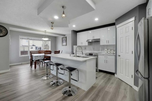 14 Marthas Close Ne, Calgary, AB - Indoor Photo Showing Kitchen With Upgraded Kitchen