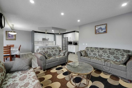 14 Marthas Close Ne, Calgary, AB - Indoor Photo Showing Living Room