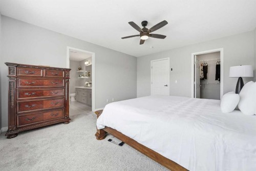 134 Windrow Link Sw, Airdrie, AB - Indoor Photo Showing Bedroom