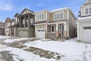 134 Windrow Link Sw, Airdrie, AB  - Outdoor With Facade 
