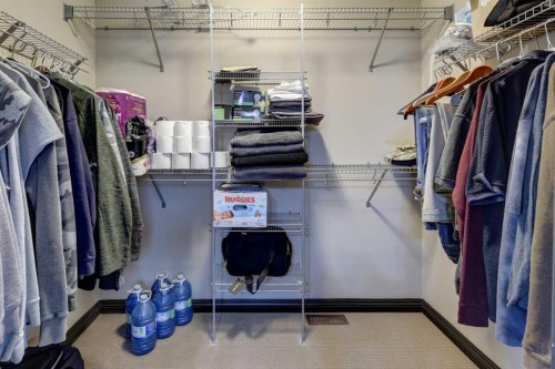 168 Sunset View, Cochrane, AB - Indoor With Storage