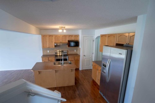 160 Covemeadow Road Ne, Calgary, AB - Indoor Photo Showing Kitchen With Double Sink