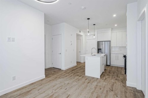 4307-111 Wolf Creek Drive Se, Calgary, AB - Indoor Photo Showing Kitchen