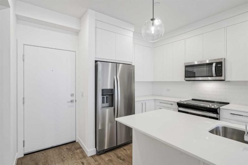 4307-111 Wolf Creek Drive Se, Calgary, AB - Indoor Photo Showing Kitchen