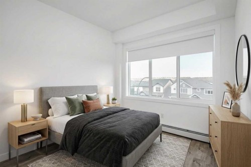 4307-111 Wolf Creek Drive Se, Calgary, AB - Indoor Photo Showing Bedroom