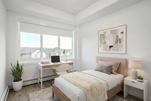 4307-111 Wolf Creek Drive Se, Calgary, AB - Indoor Photo Showing Bedroom