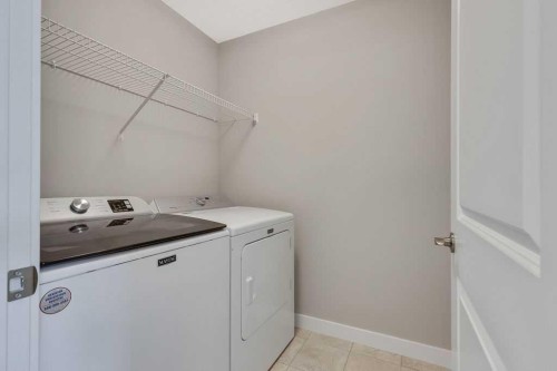 216 Creekstone Row Sw, Calgary, AB - Indoor Photo Showing Laundry Room