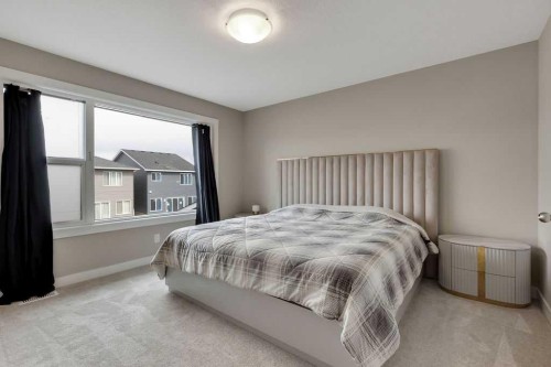 216 Creekstone Row Sw, Calgary, AB - Indoor Photo Showing Bedroom