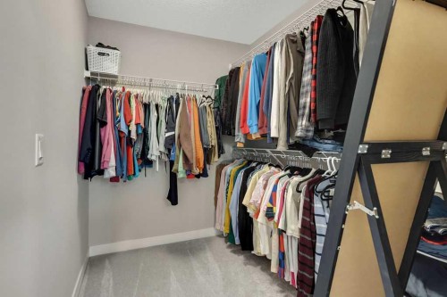 216 Creekstone Row Sw, Calgary, AB - Indoor With Storage