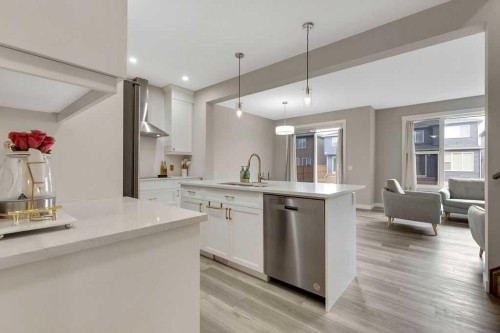 216 Creekstone Row Sw, Calgary, AB - Indoor Photo Showing Kitchen With Upgraded Kitchen