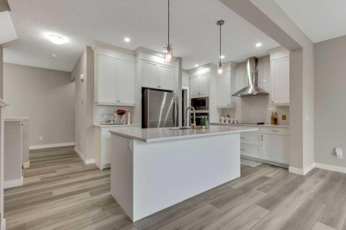 216 Creekstone Row Sw, Calgary, AB - Indoor Photo Showing Kitchen With Upgraded Kitchen