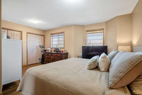 49 Spring Meadows Bay, Okotoks, AB - Indoor Photo Showing Bedroom