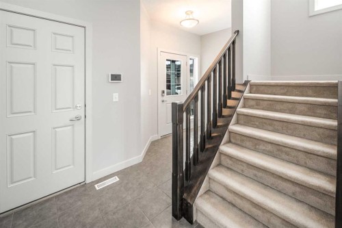 50 Everwoods Park Sw, Calgary, AB - Indoor Photo Showing Other Room