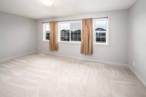50 Everwoods Park Sw, Calgary, AB - Indoor Photo Showing Other Room