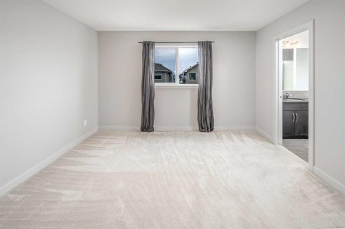 50 Everwoods Park Sw, Calgary, AB - Indoor Photo Showing Other Room