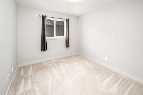 50 Everwoods Park Sw, Calgary, AB - Indoor Photo Showing Other Room