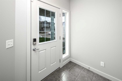 50 Everwoods Park Sw, Calgary, AB - Indoor Photo Showing Other Room
