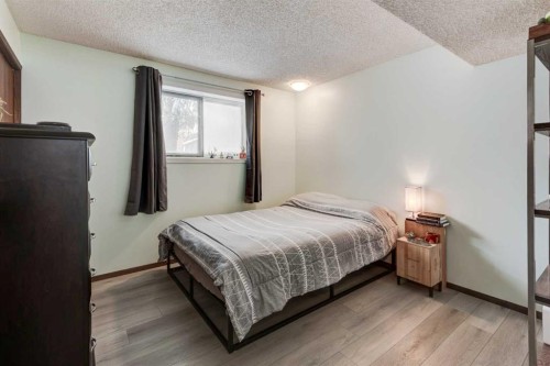1204 Ranchlands Boulevard Nw, Calgary, AB - Indoor Photo Showing Bedroom
