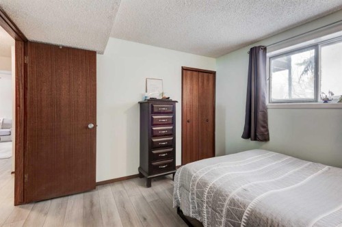 1204 Ranchlands Boulevard Nw, Calgary, AB - Indoor Photo Showing Bedroom