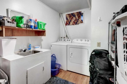 1204 Ranchlands Boulevard Nw, Calgary, AB - Indoor Photo Showing Laundry Room