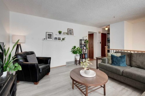 1204 Ranchlands Boulevard Nw, Calgary, AB - Indoor Photo Showing Living Room
