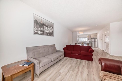 339 Wolf Creek Way Se, Calgary, AB - Indoor Photo Showing Living Room