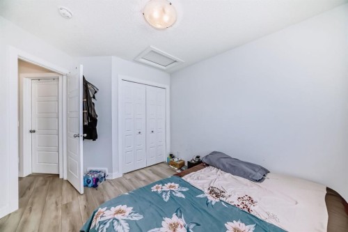 339 Wolf Creek Way Se, Calgary, AB - Indoor Photo Showing Bedroom