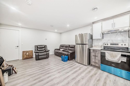 339 Wolf Creek Way Se, Calgary, AB - Indoor Photo Showing Kitchen With Stainless Steel Kitchen