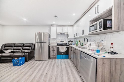 339 Wolf Creek Way Se, Calgary, AB - Indoor Photo Showing Kitchen With Stainless Steel Kitchen With Upgraded Kitchen
