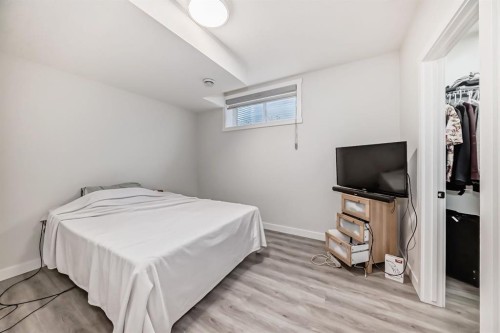 339 Wolf Creek Way Se, Calgary, AB - Indoor Photo Showing Bedroom