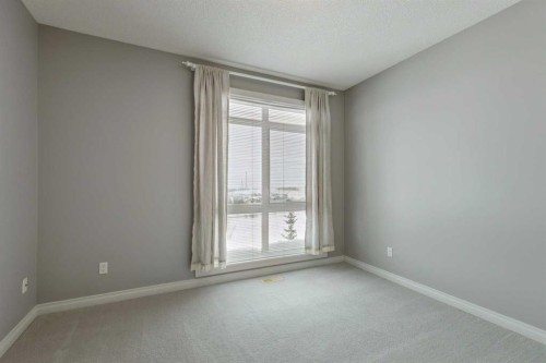 14-133 Rockyledge View Nw, Calgary, AB - Indoor Photo Showing Other Room