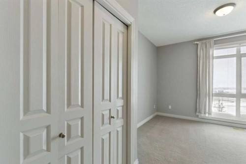 14-133 Rockyledge View Nw, Calgary, AB - Indoor Photo Showing Other Room