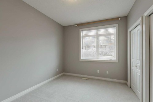 14-133 Rockyledge View Nw, Calgary, AB - Indoor Photo Showing Other Room