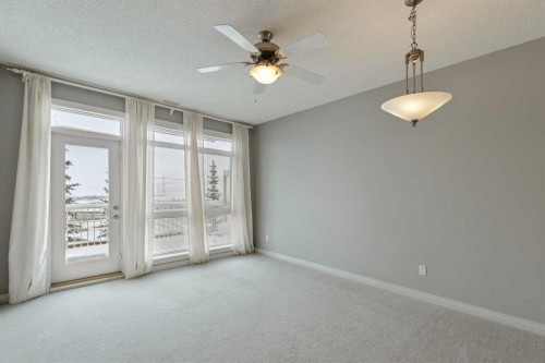14-133 Rockyledge View Nw, Calgary, AB - Indoor Photo Showing Other Room