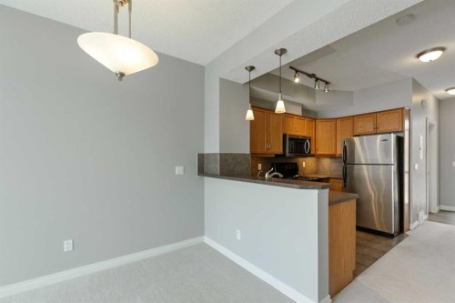 14-133 Rockyledge View Nw, Calgary, AB - Indoor Photo Showing Kitchen