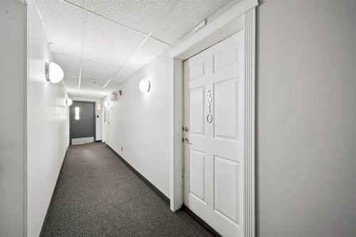310-11 Somervale View Sw, Calgary, AB - Indoor Photo Showing Other Room
