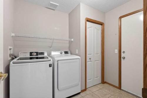 416 Douglas Glen Close Se, Calgary, AB - Indoor Photo Showing Laundry Room