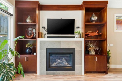 3610 8 Avenue Nw, Calgary, AB - Indoor Photo Showing Living Room With Fireplace