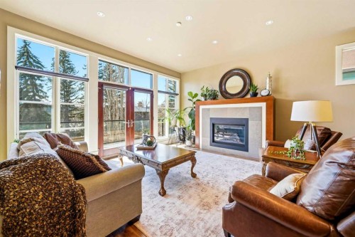3610 8 Avenue Nw, Calgary, AB - Indoor Photo Showing Living Room With Fireplace