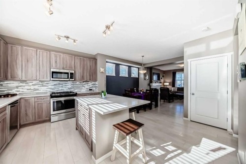 236 Sundown Road, Cochrane, AB - Indoor Photo Showing Kitchen With Stainless Steel Kitchen With Upgraded Kitchen