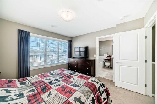236 Sundown Road, Cochrane, AB - Indoor Photo Showing Bedroom