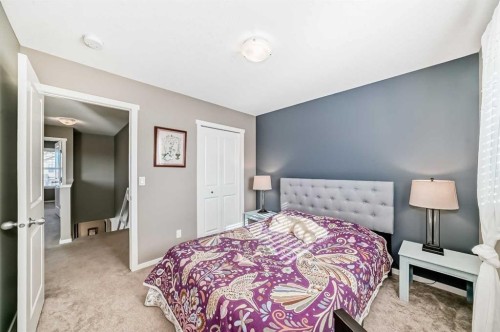236 Sundown Road, Cochrane, AB - Indoor Photo Showing Bedroom