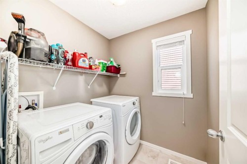 236 Sundown Road, Cochrane, AB - Indoor Photo Showing Laundry Room