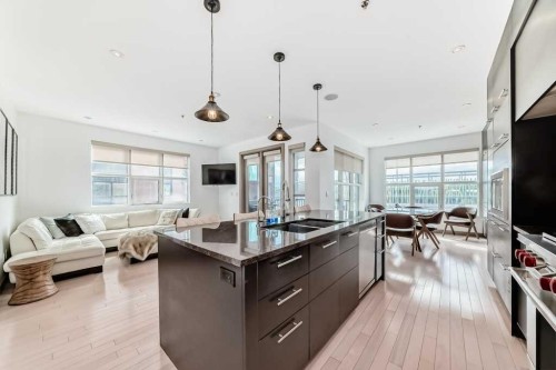 701 Aspen Meadows Hill Sw, Calgary, AB - Indoor Photo Showing Kitchen With Double Sink With Upgraded Kitchen